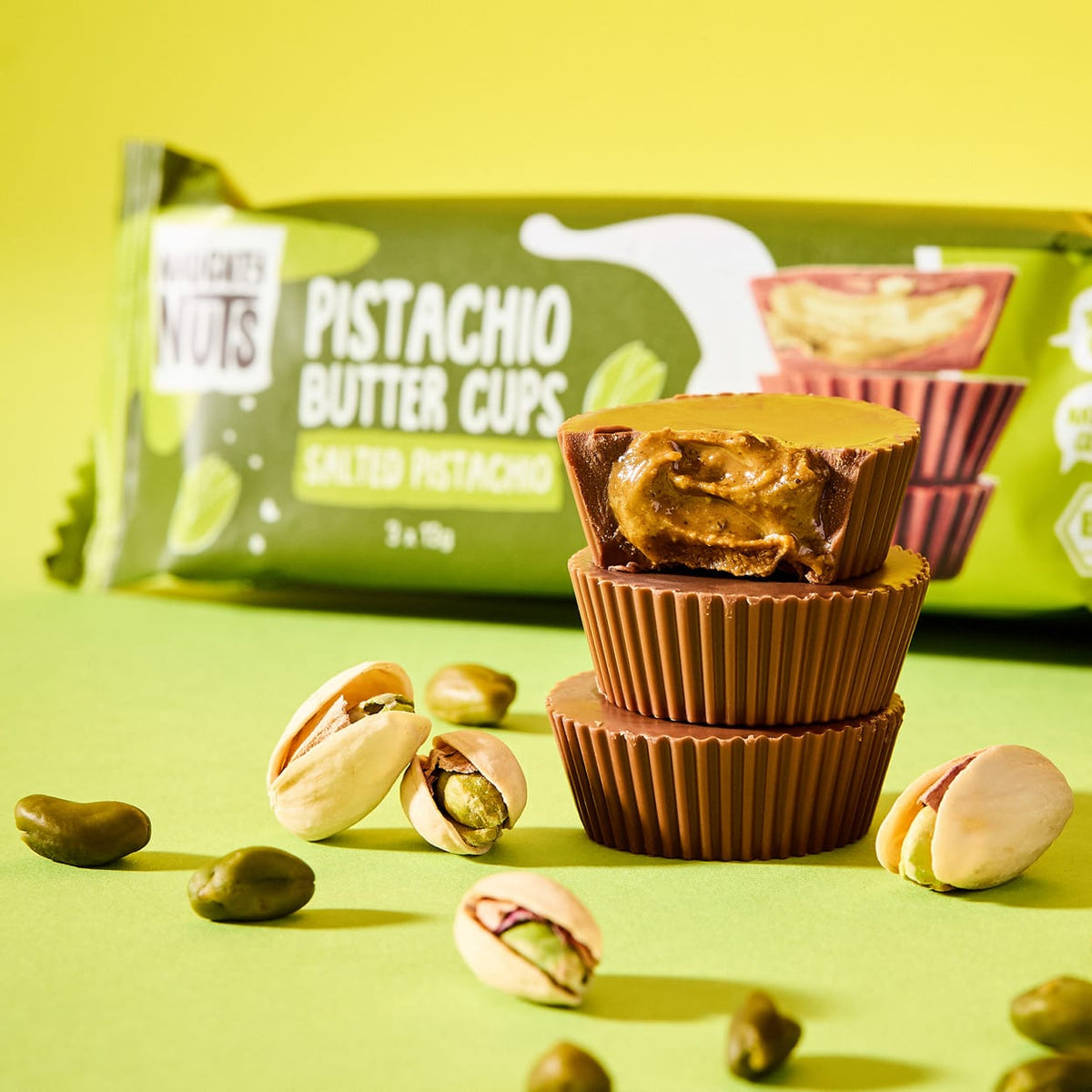 Bio Pistazienbutter Cups Salted Pistachio mit Pistazien und Verpackung
