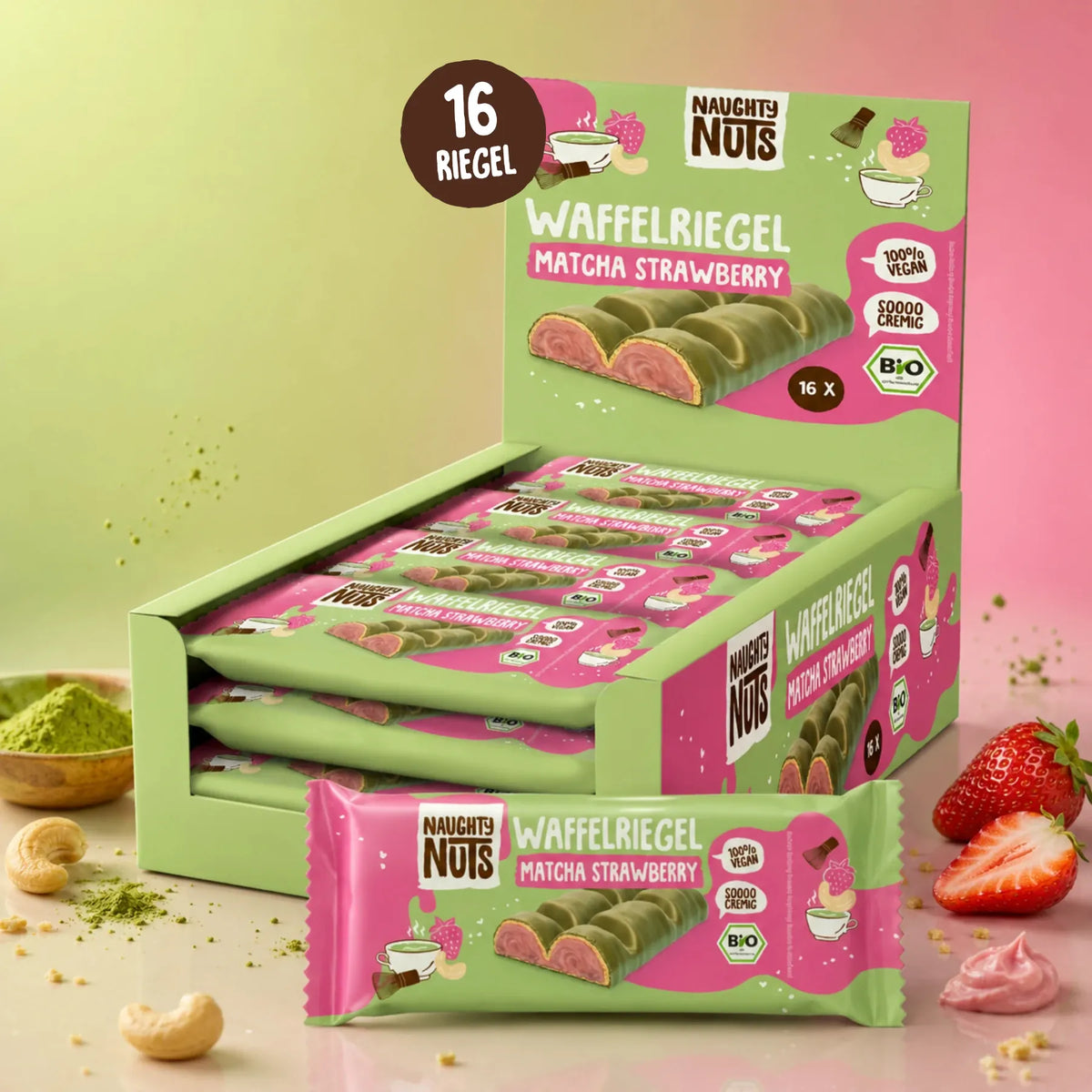 Waffelriegel Matcha Strawberry Display mit 16 Riegeln, ein Riegel ist geöffnet und zeigt die Füllung